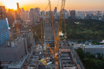 aerial view of construction site with tower crane urban construction Rush hour of concrete pouring
