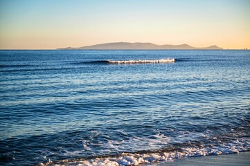 Blue Cretan sea, Dia island on horizon, Amoudara, Crete, Greece. © slunicko24