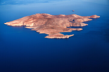 Aerial view to Dia island in blue sea water, Crete. - 544820371