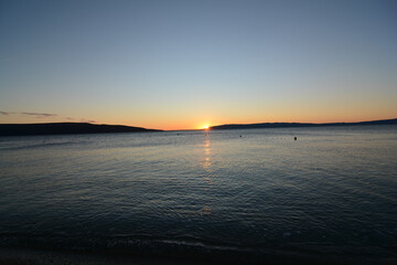Fototapeta na wymiar tramonto dalla spiaggia di kovacine isola di cres
