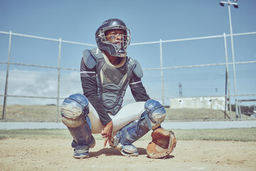 Baseball, fitness and catcher on a baseball field training for a sports game in an outdoor exercise workout in summer. Focus, wellness and healthy black man in safety gear with a secret hand gesture