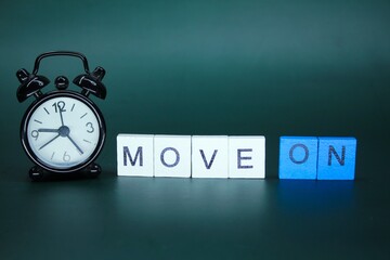 bell clock with the word move on. Business, motivational and inspirational concept.