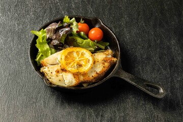 白身魚のムニエル　 white fish grilled with butter - obrazy, fototapety, plakaty