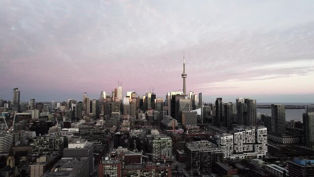 Flying toward from the Toronto Skyline at sunset 4K captured by Anthony Saleh