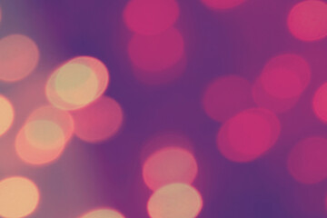 Pink purple bokeh lights abstract blurry background. 