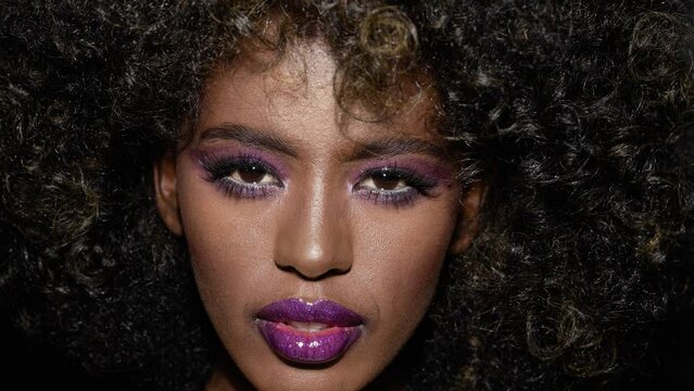 Close up shot on sensual and sexy face of afro american female model