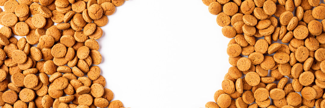 Banner with Dutch holiday Sinterklaas background with copy space fot text. Kruidnoten cookies. Concept for children party Saint Nicolas day five december. Top view, overhead.