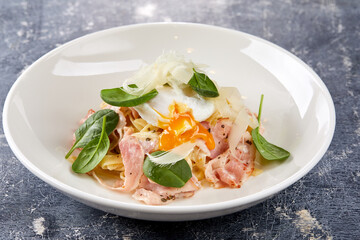 Carbonara pasta. Spaghetti with pancetta, egg, parmesan cheese and cream sauce