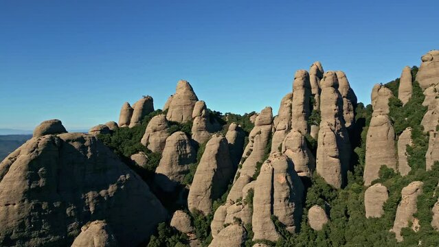 Close-up view of the Montserrat mountains and their high point-shaped peaks