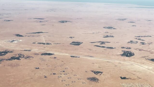 Doha desert and outskirts as seen from airplane - Qatar