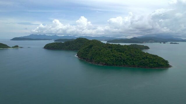 Arcing drone shot exploring the stunning Beras Basah Island in Malaysia
