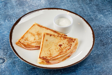 tasty pancakes with sour cram