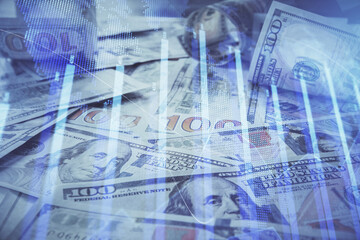 Multi exposure of forex chart drawing over us dollars bill background. Concept of financial success markets.