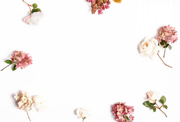 Autumn frame of flowers in red, burgundy colors. Roses, hydrangea. Flower composition on white background.