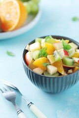 A bowl with fresh fruit salad