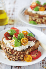 Sandwiches with cherry tomatoes and cottage cheese