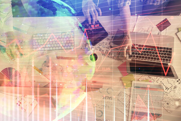 Multi exposure of man and woman working together and financial chart hologram. Business concept. Computer background.