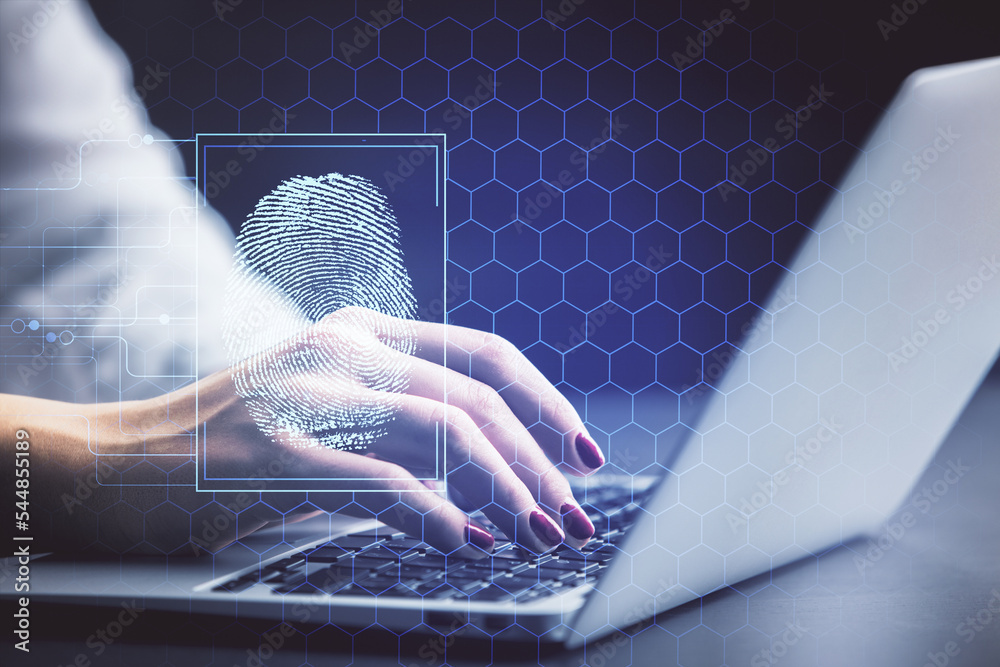 Poster double exposure of woman hands typing on computer and fingerprint drawing. security concept.