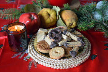 Lovely close up image of Christmas cookies decorated on a plate on a table.