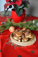 Lovely close up image of Christmas cookies decorated on a plate on a table.