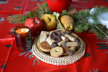 Lovely close up image of Christmas cookies decorated on a plate on a table.