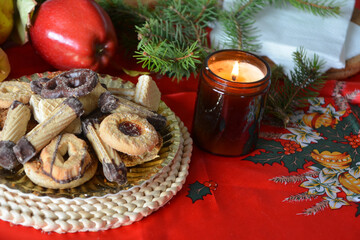 Lovely close up image of Christmas cookies decorated on a plate on a table.