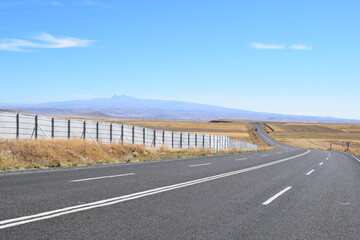 Fototapeta premium Protective wall against snow storm along a road in Kars province, Turkey. Photo taken in September 2022.