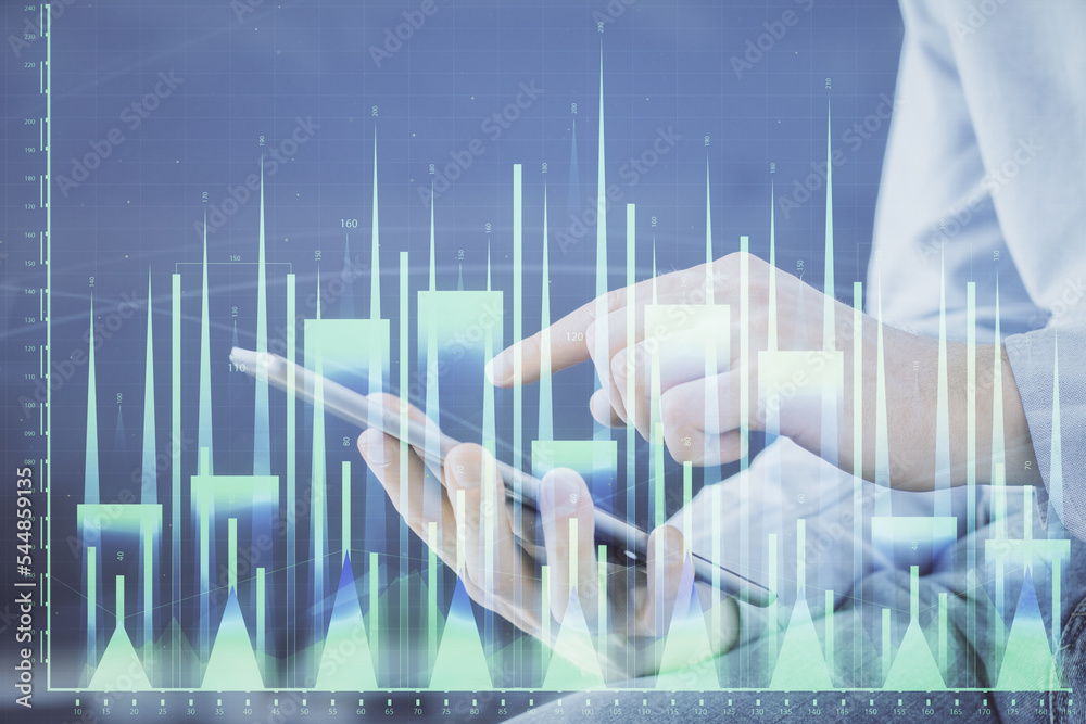 Aufkleber double exposure of man's hands holding and using a digital device and forex graph drawing. financial
