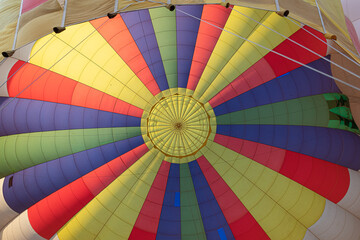 Fototapeta premium Inside hot air balloon inflating, hot air balloon flying view from below