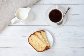 Cake with coffee cup. Top view