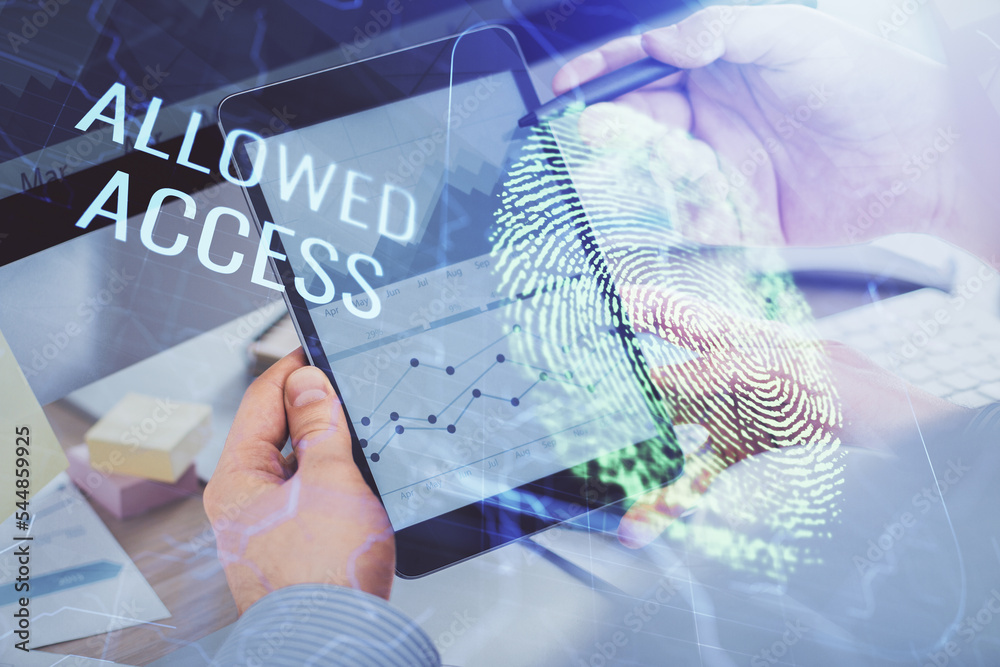 Poster Double exposure of man's hands holding and using a digital device and fingerprint hologram drawing. Security concept.