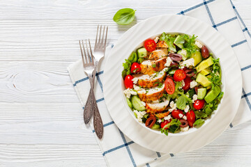 Mediterranean grilled Chicken Salad in white bowl