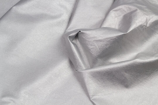 Close up detail white, bronze, silver leather and texture background