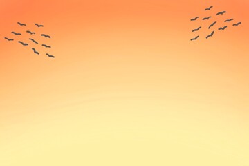 夕焼けとカラスの群れのシンプルな背景