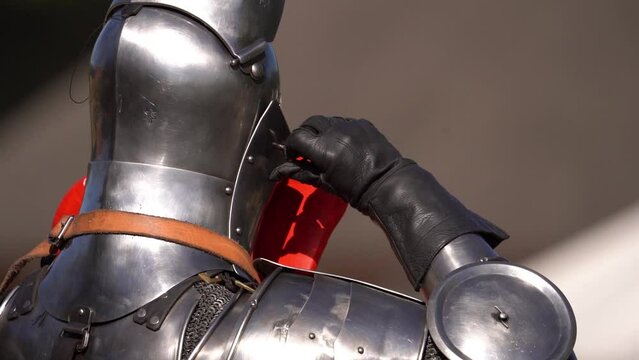 Knight On Horse Closing Helmet At Jousting Event Show With Shining Armor
