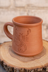 Ceramics, a ceramic product made with their own hands, made on a potter's wheel, jug, mug, clay, ornament.