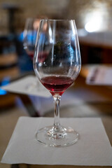 Wine tasting in underground cellars caves of French wine domain in Puligny-Motrachet village, Burgundy, France