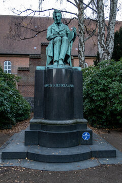 Copenhagen, Denmark A statue of Soren Kierkegaard in the Royal library park.