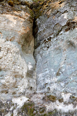 White rock, cliff closeup. Texture background. Selective focus