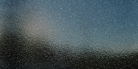 Gradient monochrome rippled background. Abstract matte metal texture. Dark tinfoil surface. 3d illustration
