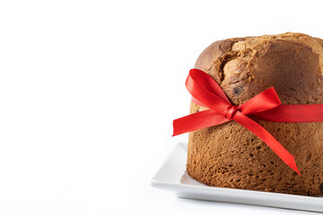 Traditional Christmas panettone with red tie isolated on white background. Copy space