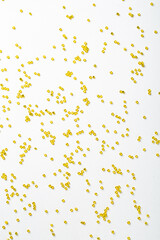 Colorful Yellow Plastic Beads on White Background