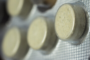 Pills in a blister pack, medicines, macro, selective focus