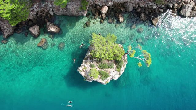 Aerial drone video Baska Voda beach and waterfront aerial view, Makarska riviera in Dalmatia, Croatia


