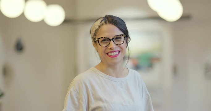 Portrait of smiling woman in office