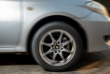 Fototapeta na wymiar Car motion blur, spinning wheel, blurry image, blurry, background