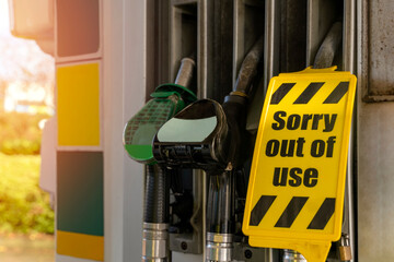 Fuel shortage at petrol station,  fuel pump with out of order sign on