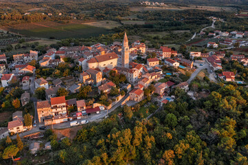 Last rays of light over the town of Visnjan, Istria, Croatia. - 544890902