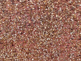 texture of a wall,Abstract background of old plaster wall and small stones.