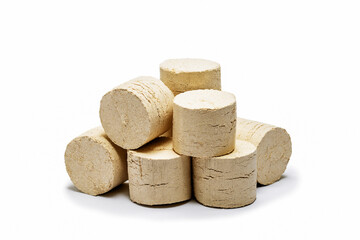 wood sawdust briquettes isolated on white. organic pressed sawdust fuel. concept of eco fuel for heating. - obrazy, fototapety, plakaty